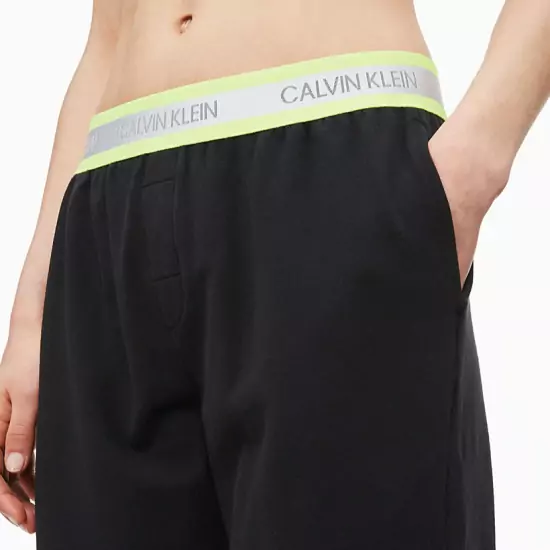 Čierne tepláky Calvin Klein Neon